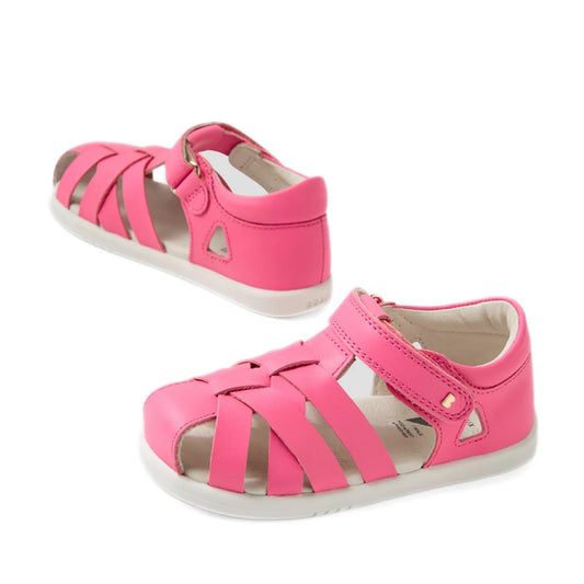 A pair of Bobux Iwalk IW Tropicana II Pink Lemonade Leather Sandals for toddlers, featuring velcro straps and closed-toe cut-out sides, displayed on a white background.