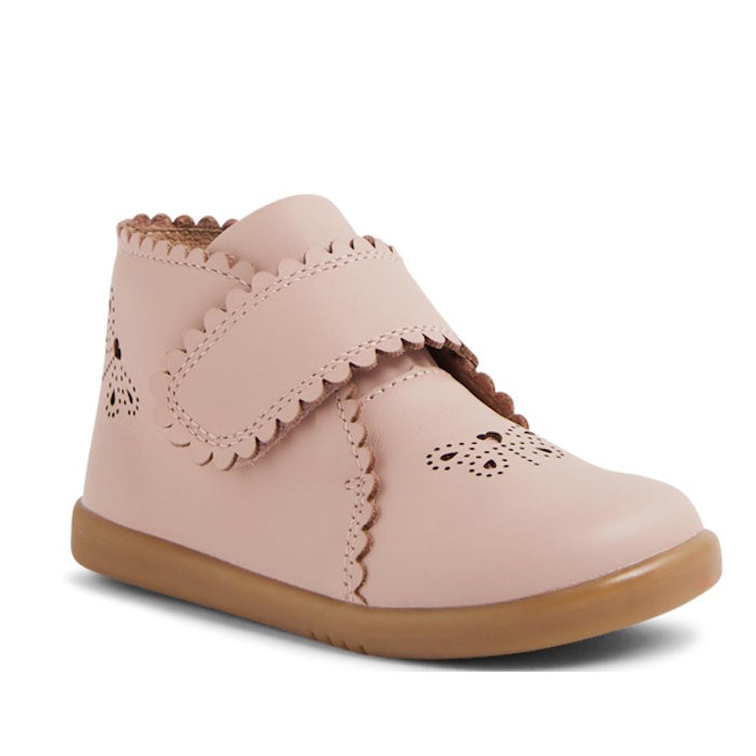 The Bobux IW Iwalk Willow Leather Boot Cameo Rose Pink features scalloped edges, cut-out patterns, an adjustable Velcro strap, and a light brown rubber sole—ideal stylish walking shoes for toddlers., 9420068545120, 9420068545137, 9420068545144, 9420068545