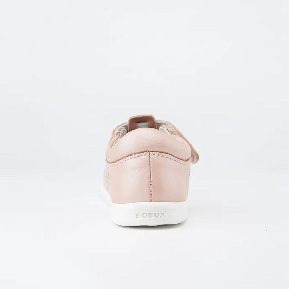 The Bobux IWalk IW Zap II Sandal Pink Shimmer is a light pink leather sandal shown from the back, featuring BOBUX embossed on the white sole and a brown pull tab at the heel, set against a plain white background., 9420068509245, 9420068509252, 94200685092