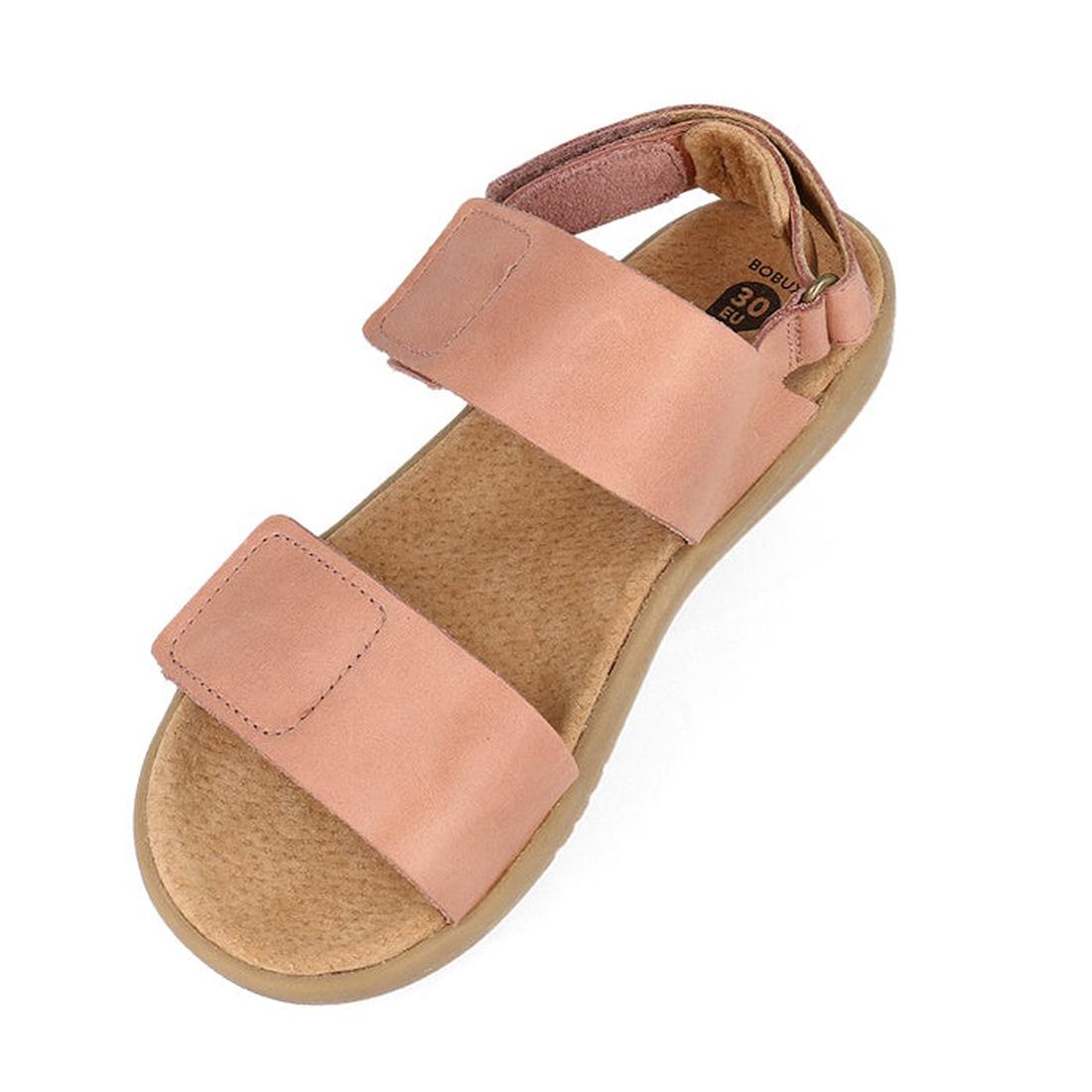 The Bobux Kid+ Plus Italian Clay Coast Open Toe Sandal 851201 is a pink kids’ sandal with two wide Velcro straps, cushioned beige footbed, flat sole, and breathable open toe—designed for adjustable summer comfort., 9420075767065, 9420075766723, 9420075768