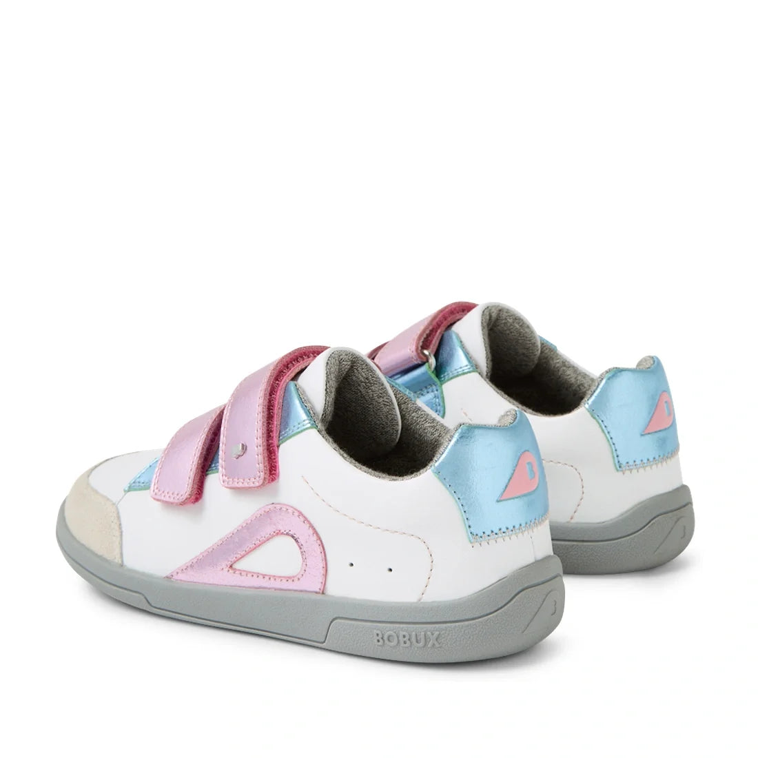 A pair of Bobux KP Kids Plus Blaze Leather Sneakers in White Pink Metallic, featuring white, pink, and light blue panels, gray soles, and pink Velcro straps. Designed with a cushioned insole for all-day comfort and shown from the back and side angles., 94