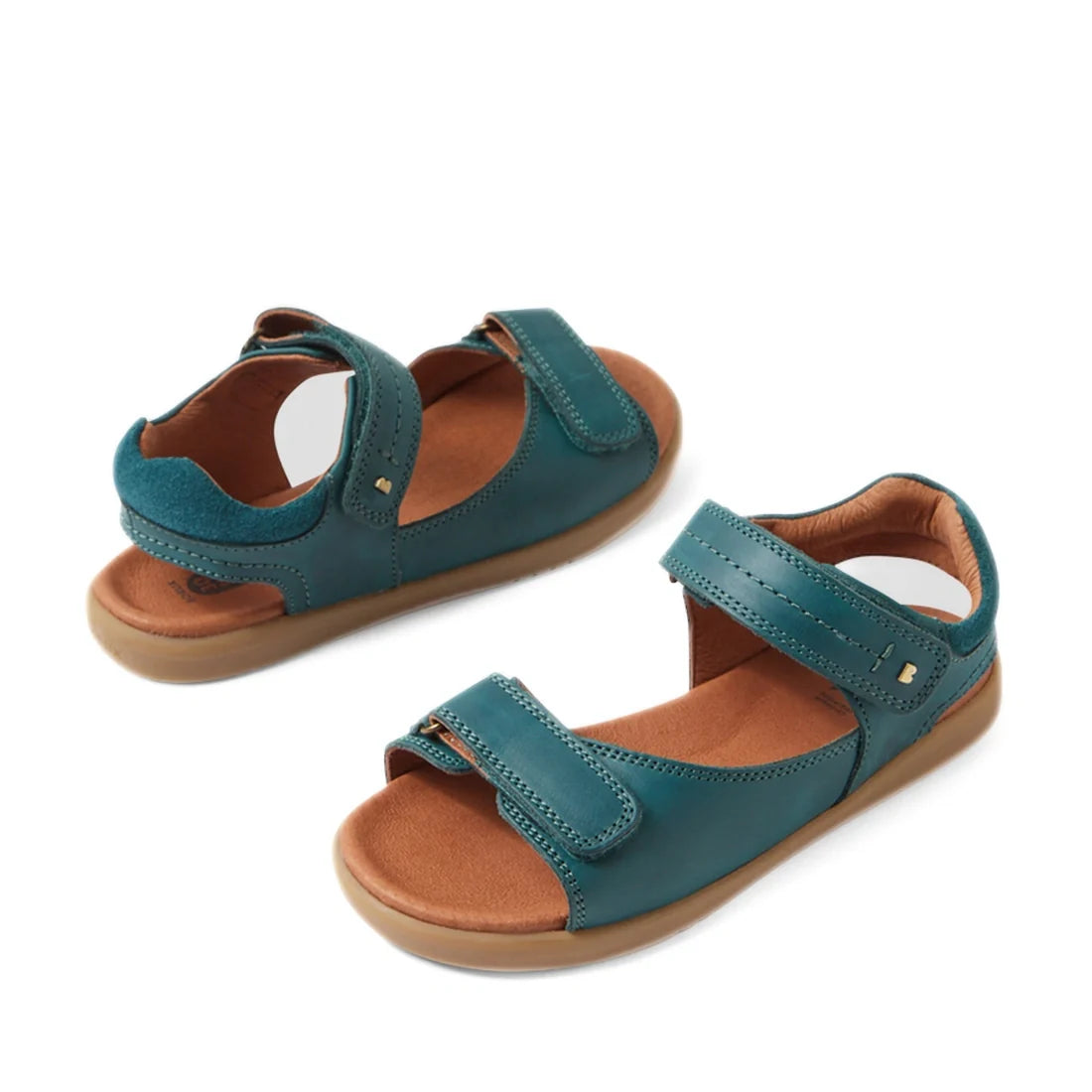 A pair of Mediterranean green open-toed leather sandals with brown insoles and tan soles, the Bobux KP Kids Plus Driftwood Leather Sandal features adjustable Velcro straps at the ankle and across the toes—offering boys a comfortable and stylish option for