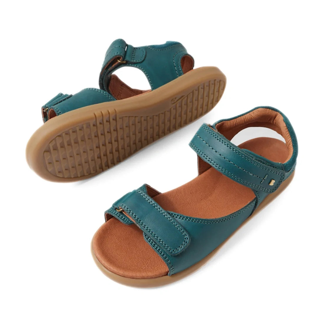 A pair of Bobux KP Kids Plus Driftwood Leather Sandal in Mediterranean Green, featuring tan soles and adjustable Velcro straps, is shown from the side and bottom on a white background., 9420074859013, 9420074858993, 9420074859006, 9420074858979, 942007485