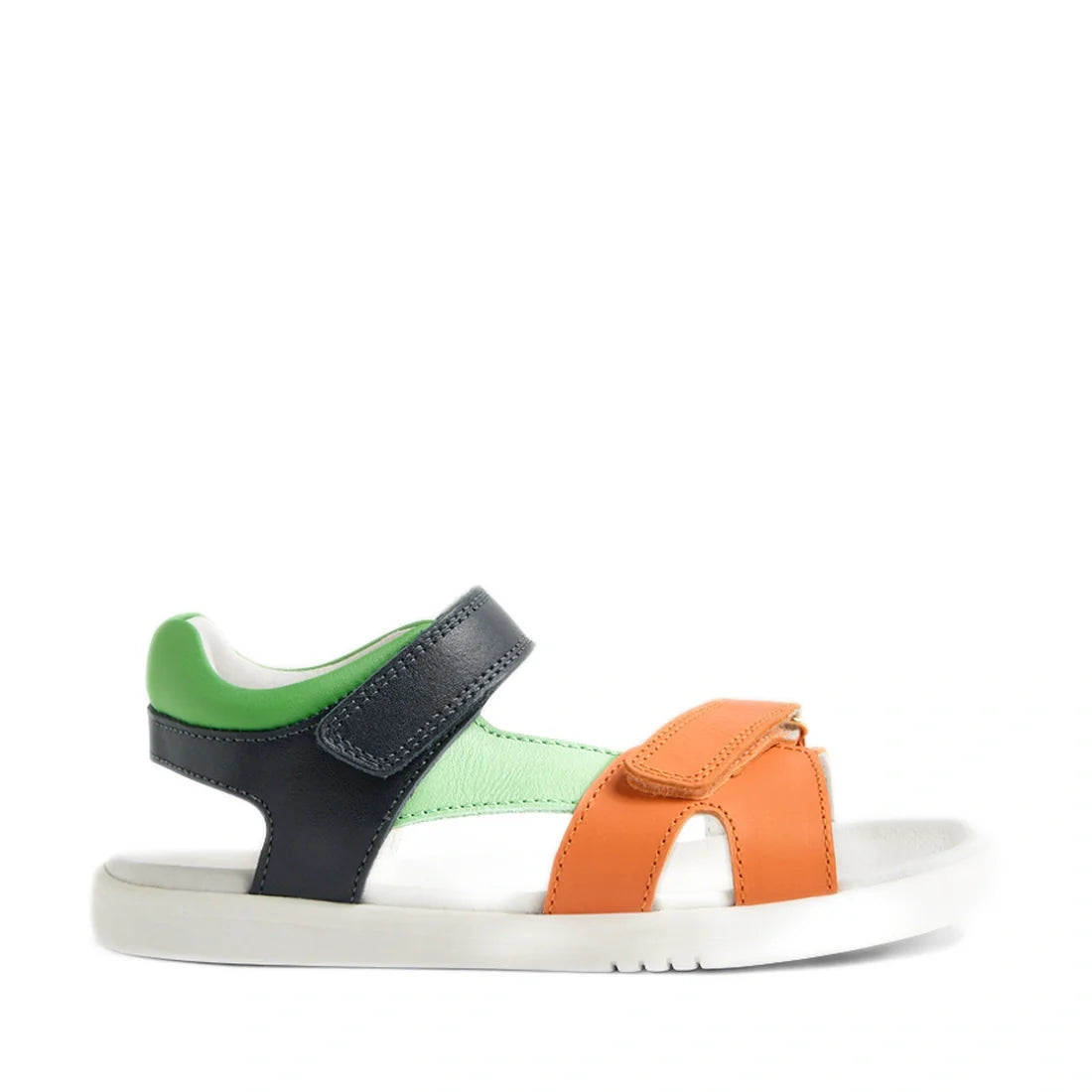 The Bobux KP Kids Plus Dune Leather Sandal Navy features a white sole, an orange strap across the toes, a green heel section, and black adjustable straps over the ankle and side, all displayed against a white background. These breathable summer sandals ar
