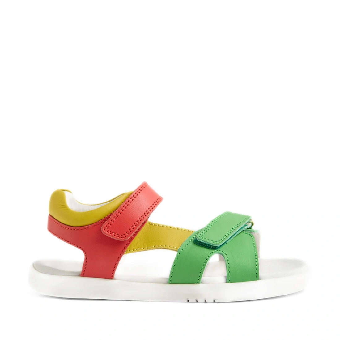 Bright and playful, the Bobux KP Kids Plus Dune Leather Sandal Grenadine Red features a white sole paired with a grenadine red heel strap, sunny yellow middle strap, and a vivid green front strap—all secured by adjustable fastenings for an ideal fit. Thes