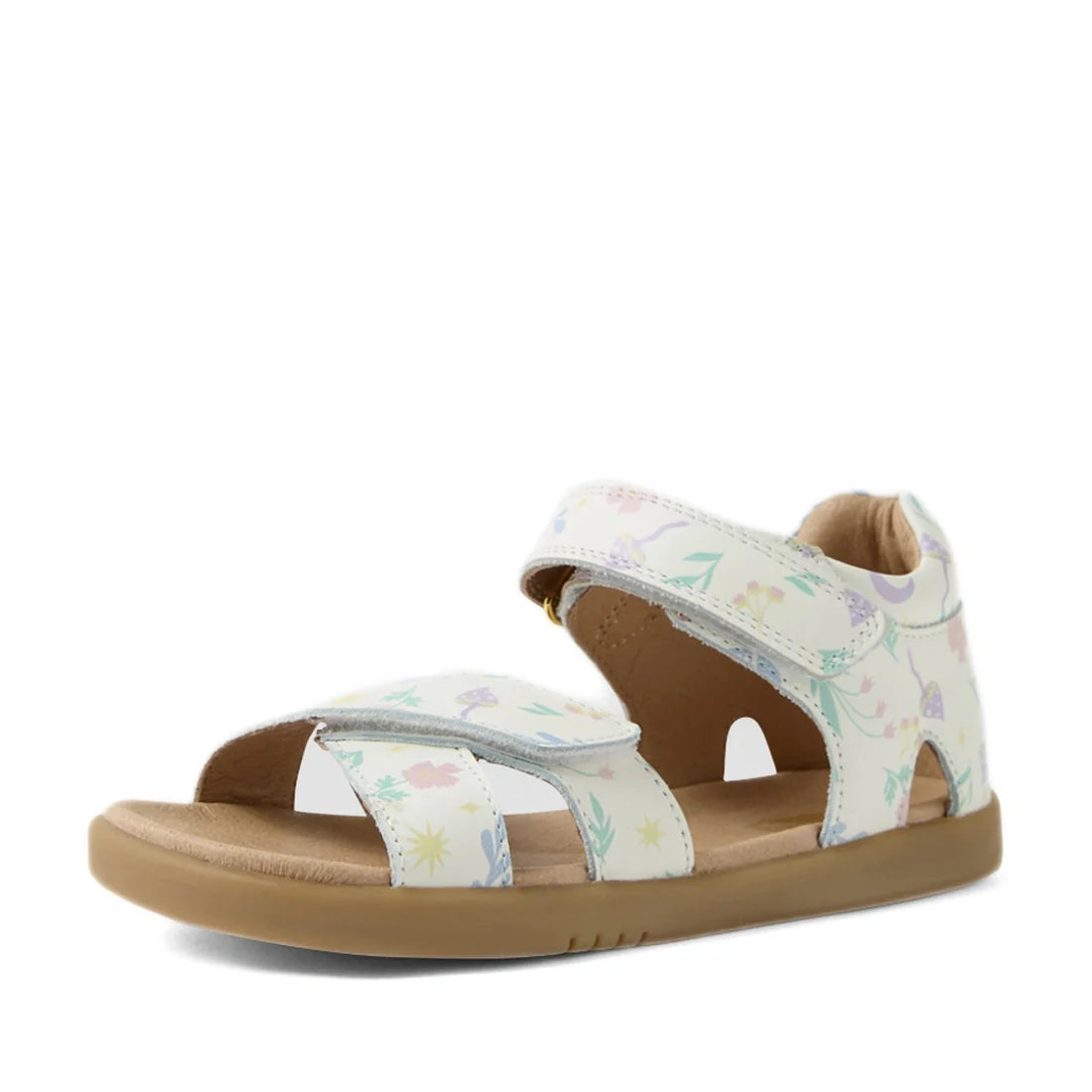 The Bobux KP Kids Plus Flora Leather Sandal White Floral features a tan sole and white leather straps adorned with a pastel floral pattern. Designed for all-day comfort, these adjustable kids’ sandals include two hook-and-loop closures and an open toe and