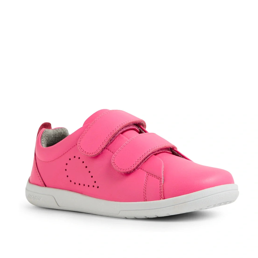 The Bobux KP Kids Plus Grass Court 2 II Leather Sneaker in Pink Lemonade is a vibrant children’s shoe featuring two Velcro straps, a gray inner lining, perforated side detailing, and a white rubber sole. Shown at an angle on a white background, this kids’