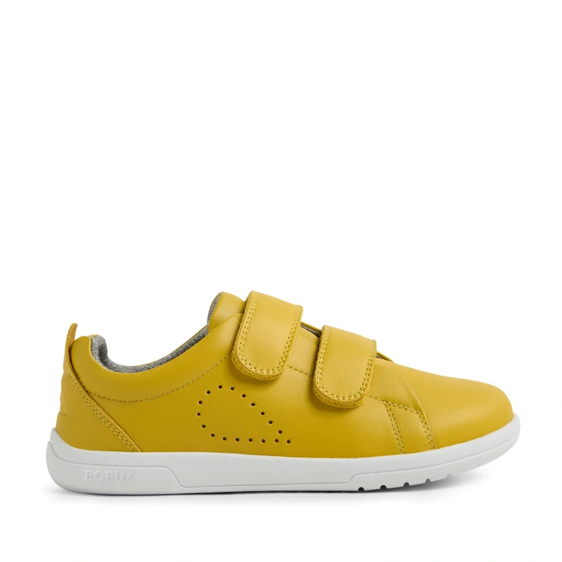 The Bobux KP Kids Plus Grass Court 2 II Leather Sneaker Mango Mint is a yellow leather kids’ sneaker with a wide fit, designed in the signature Grass Court style. It features two Velcro straps, a white sole, and a small perforated heart shape on the side.