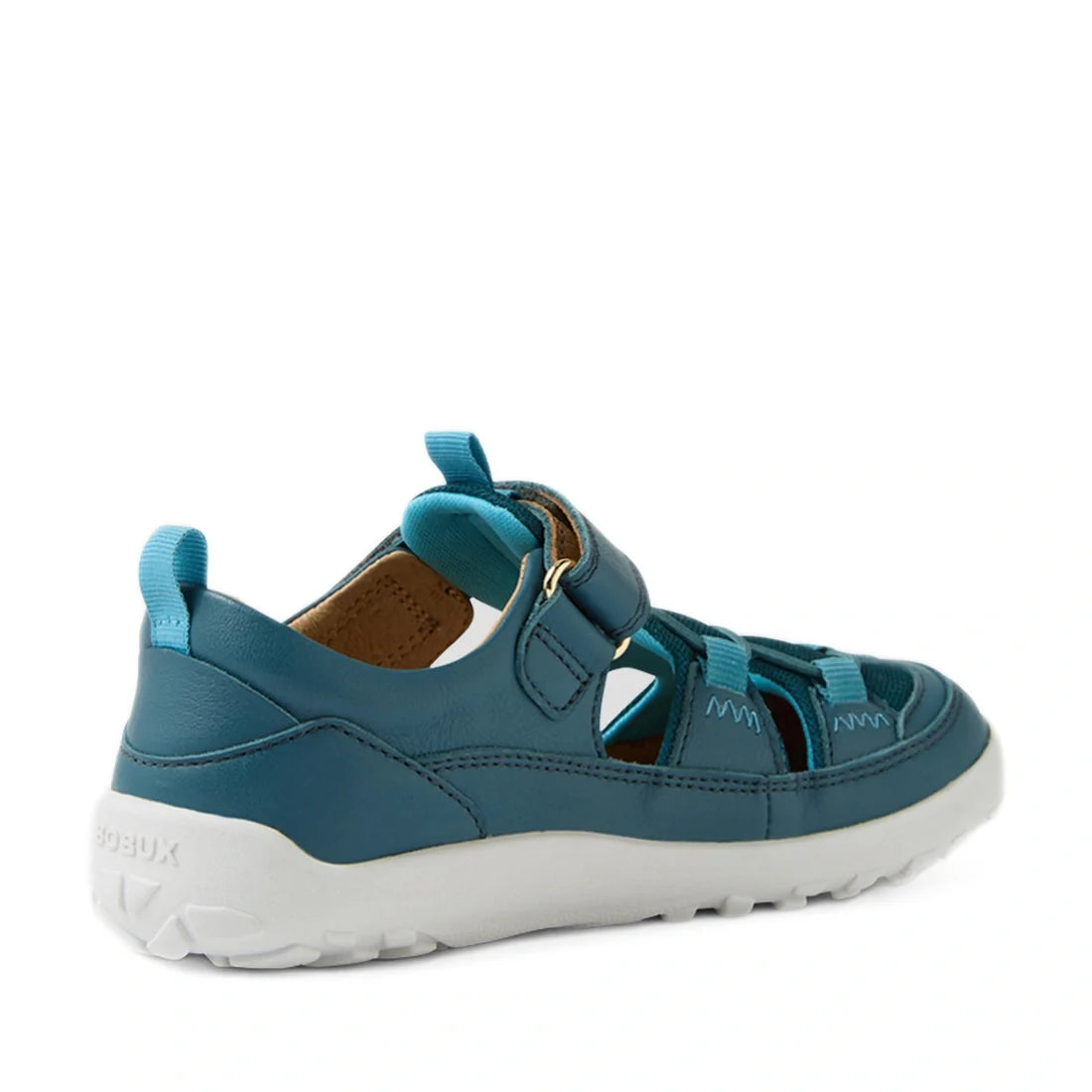 The Bobux Kid+ KP Rocky Leather Closed Toe Sandal in Mediterranean Green Barefoot, featuring cutouts, a hook-and-loop strap, and a white textured sole, is shown angled left on a plain background., 9420074860569, 9420074860576, 9420074860583, 9420074860590