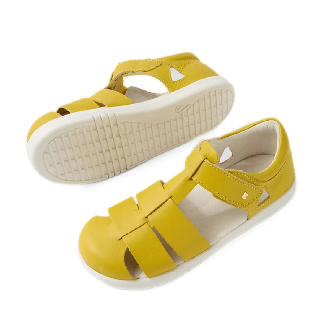 A pair of Bobux Kid + Plus Tidal Closed Toe Quick Dry Sandals in Mango Mint, featuring yellow leather with open sides, Velcro straps, and white rubber soles. One sandal is shown from the top and the other from the bottom., 9420074809643, 9420074809650, 94