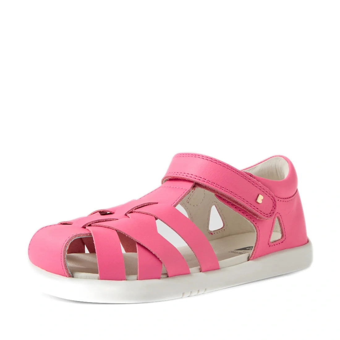 The Bobux Kids Plus KP Tropicana II Pink Lemonade Quick Dry Sandal is a pink children’s sandal featuring cut-out details, a closed toe, and a convenient velcro strap over the top. Shown on a white background, this stylish pair makes perfect kids’ summer s
