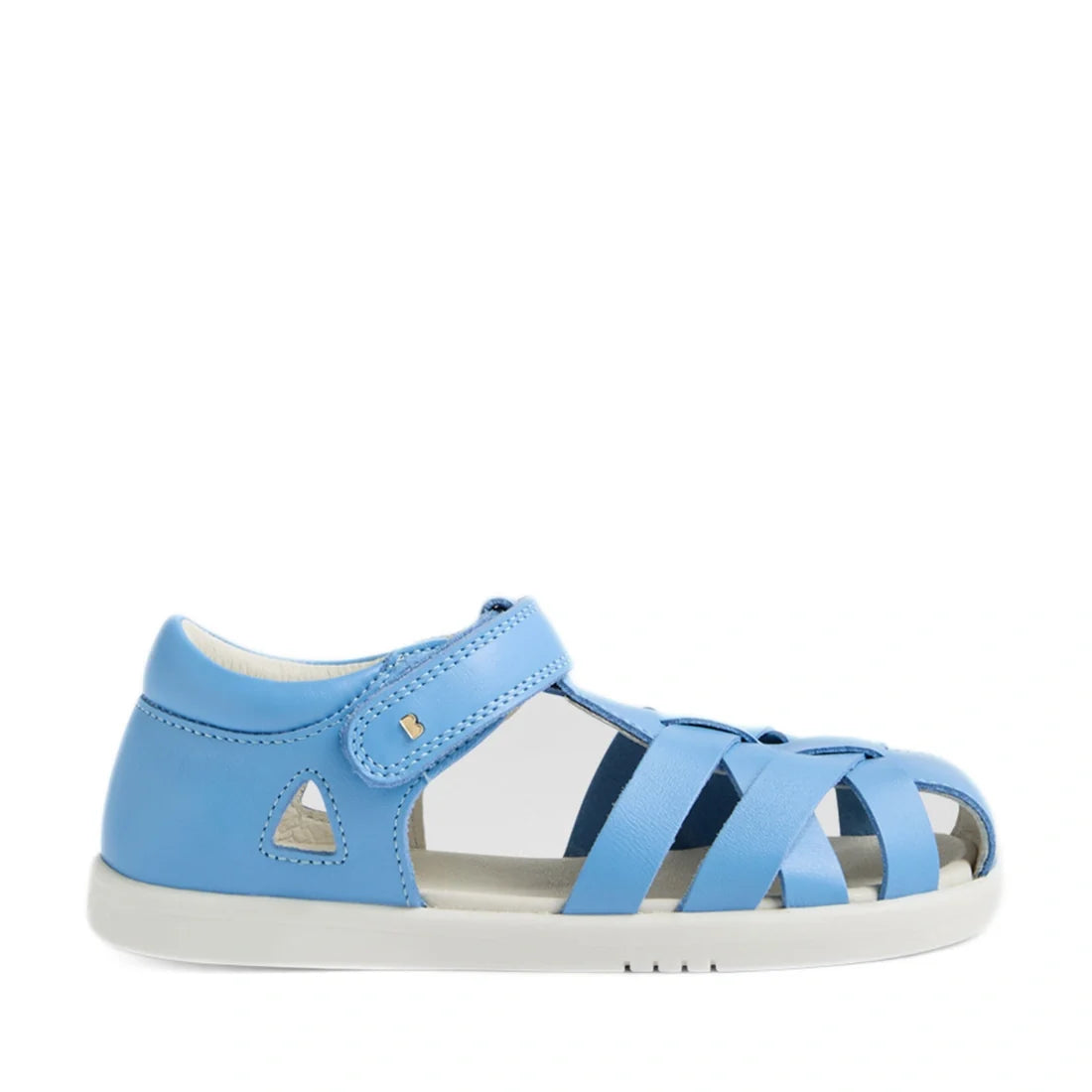 Introducing the Bobux Kids Plus KP Tropicana II Baltic Sea Blue Quick Dry Sandal: a light blue children’s sandal inspired by classic closed-toe leather designs, featuring a closed heel, open toe, white sole, and secure Velcro strap. Displayed in side prof