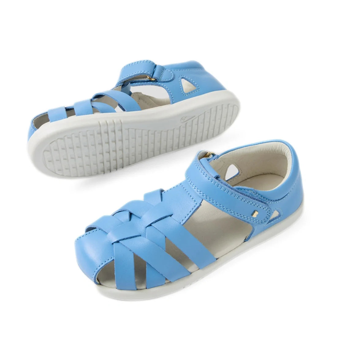 A pair of Bobux Kids Plus KP Tropicana II Baltic Sea Blue Quick Dry Sandals, featuring open toes, white soles, and velcro straps, is shown from the side and bottom view against a white background., 9420074861269, 9420074861276, 9420074861283, 942007486129