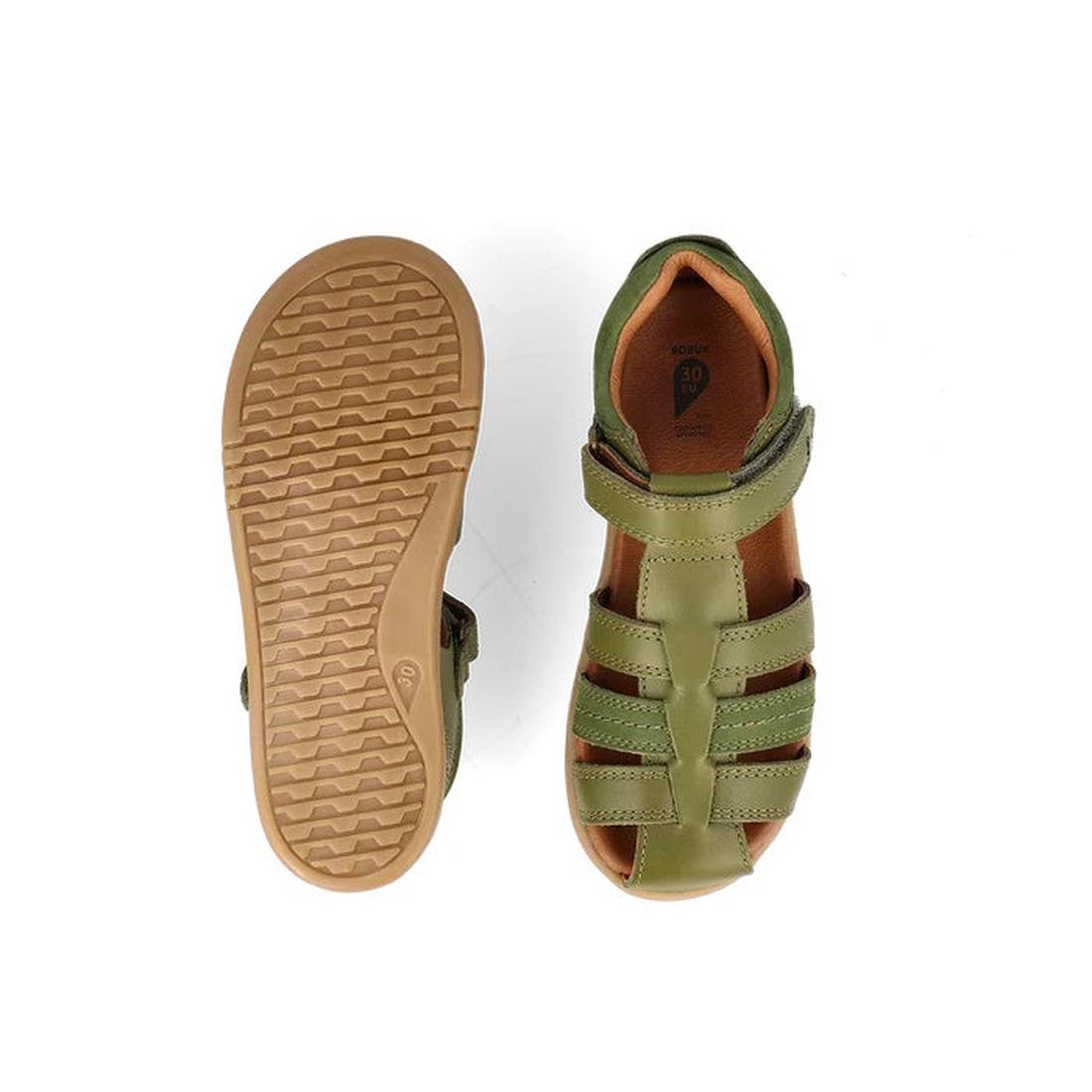 The Bobux Kid+ Plus Roam Sea Kelp Green Closed Toe Sandal 830528 is displayed; one shows the zigzag-tread sole, while the other highlights the open-toe design and secure Velcro strap., 9420075767706, 9420075773240, 9420075774537, 9420075771734, 39067, 390