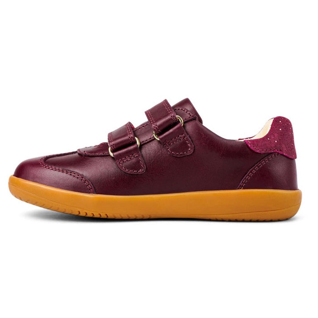 The Bobux Kids Plus KP Sprite Sneaker in Boysenberry features a maroon leather upper, unisex design, three velcro straps, tan rubber sole, and pink suede heel accent, displayed in a left-facing side view., 29968, 9420071316663, 9420071316670, 942007131668