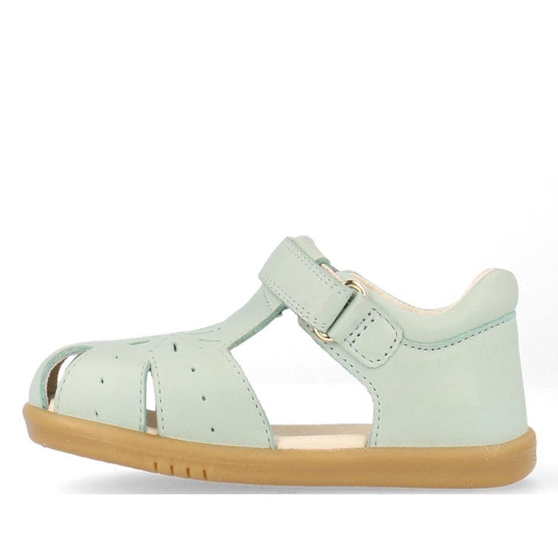 The Bobux Iwalk IW Compass Kids Mist Blue Leather Sandal 641205 is a closed toe toddler sandal in mist blue with side cutouts, buckle strap, and light brown rubber sole—ideal summer footwear for little ones., 9420075708464, 9420075708471, 9420075708488, 9