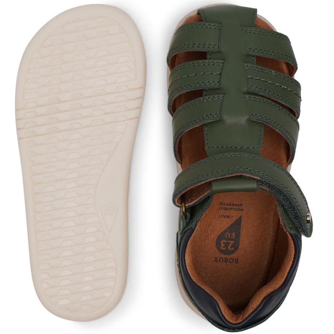 A pair of Bobux IWalk Roam Sandal Forest Navy Leather sandals features closed toes, a hook-and-loop strap, and a textured off-white sole. One boys’ summer sandal is shown from the top, the other from the side., 9420071319213, 9420071319220, 9420071319237,