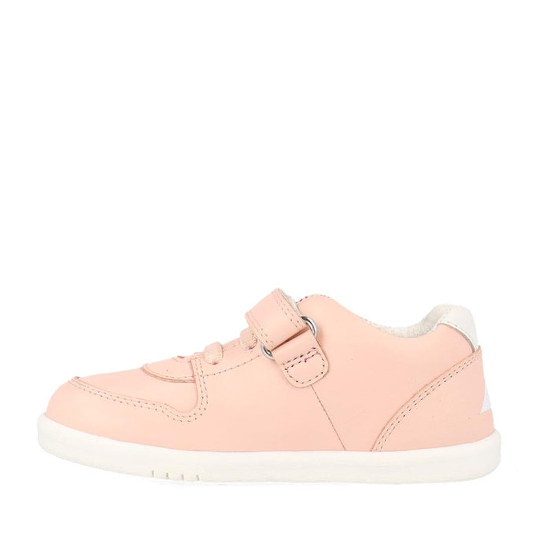 The Bobux Kids IWalk IW Comet Sneaker in Seashell Pink/White is a retro-inspired kids' shoe with a flexible white sole, velcro strap, lace-up detail, and white heel accents. Shown in side profile on a plain white background., 9420075706286, 9420075706293,