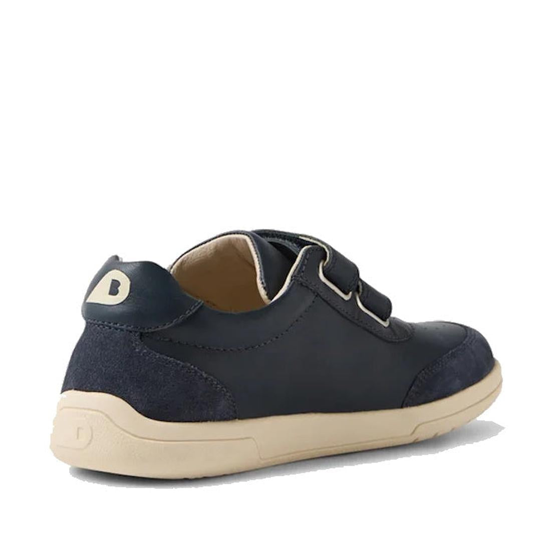 Bobux KP Kids Plus Champ 2 II Sneaker: navy leather junior sneaker with beige sole, easy velcro straps, and a D logo on the heel.  ksnz, 9420074829436, 9420074829443, 9420074829450, 9420074829467, 9420074829474, 9420074829481, 9420074829498