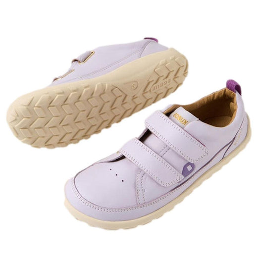 The Bobux Kid+ Dawn Leather Sneaker in Thistle Lavender features soft leather, two velcro straps, cream rugged soles, and a purple heel pull tab—perfect kids' sneakers for comfort and style.