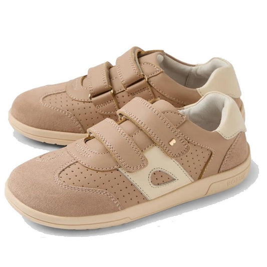 Bobux KP Kids Plus Titan Juniors Leather Sneaker in Warm Taupe features adjustable hook-and-loop straps, perforated sides, a cushioned collar, and a slip-resistant sole. Displayed on a white background.