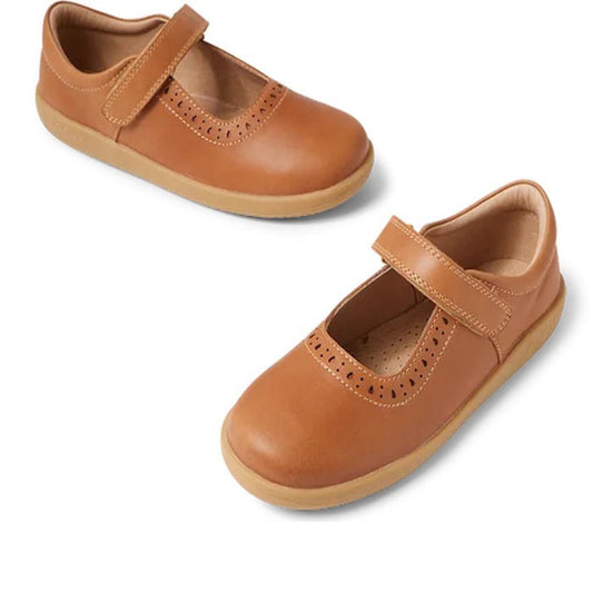 Bobux Kid+ Lola Girls Mary Jane Leather Shoes in Caramel Tan (852801) feature Velcro straps and decorative brogue perforations, shown on a white background.