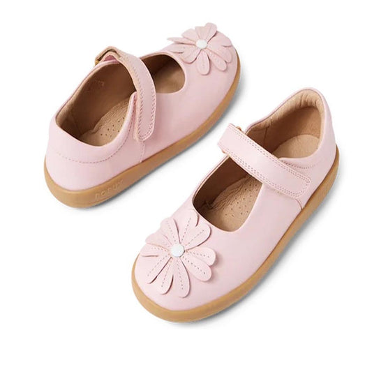 Bobux Kid+ Pixie Girls Mary Jane shoes in Parfait Pink have comfy tan rubber soles, easy Velcro straps, and cheerful daisy details.  ksnz