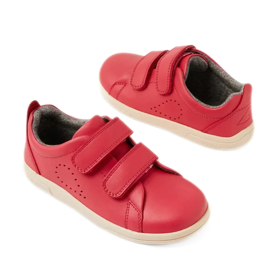 A pair of Bobux KP Kids Plus Grass Court 2 II Leather Sneakers in Radiant Raspberry, featuring two adjustable Velcro straps and white soles, displayed on a white background. These street-styled trainers offer double-strap fastenings for a comfortable and 