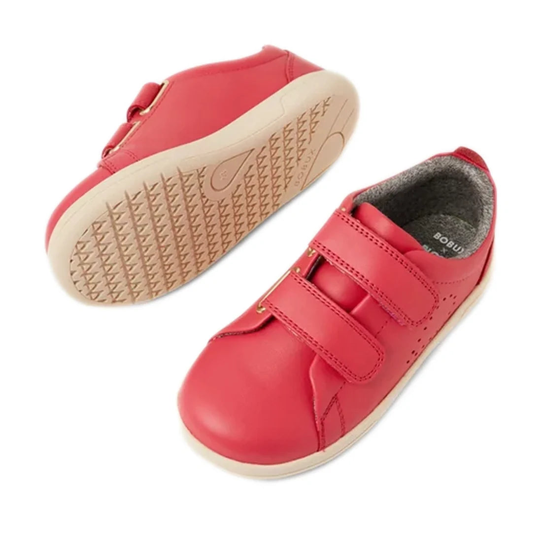 A pair of Bobux KP Kids Plus Grass Court 2 II Leather Sneakers in Radiant Raspberry, featuring beige soles and two adjustable double-strap velcro fastenings on each shoe, shown from the side and bottom views for a street-style trainers look., 942007484442