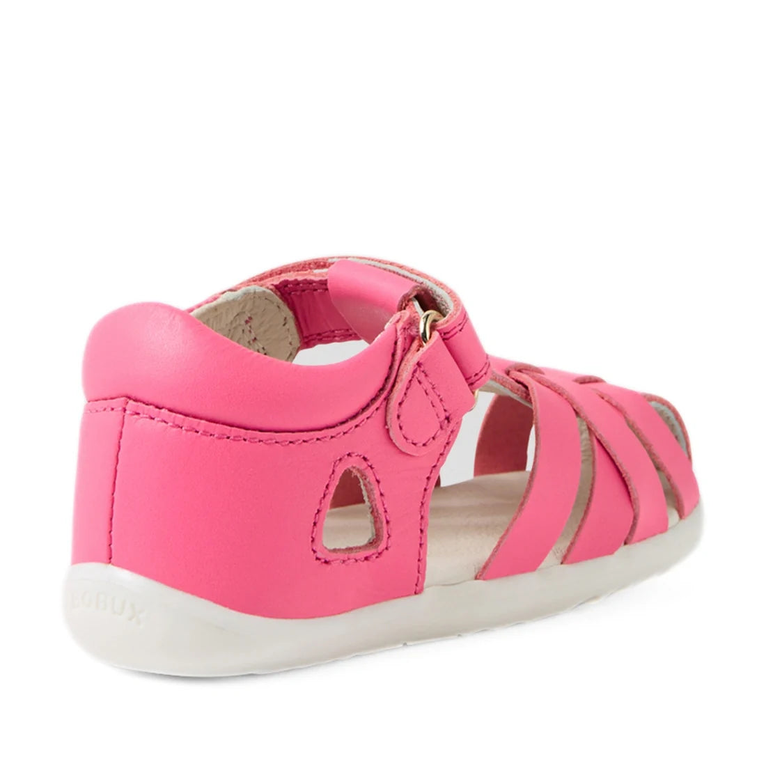A single Bobux Step Up SU Tropicana II Pink Lemonade Closed Toe Sandal is shown from a rear side angle on a white background. This stylish toddler sandal features a closed heel, open toe, side cutouts, and a hook-and-loop strap, offering comfort and durab