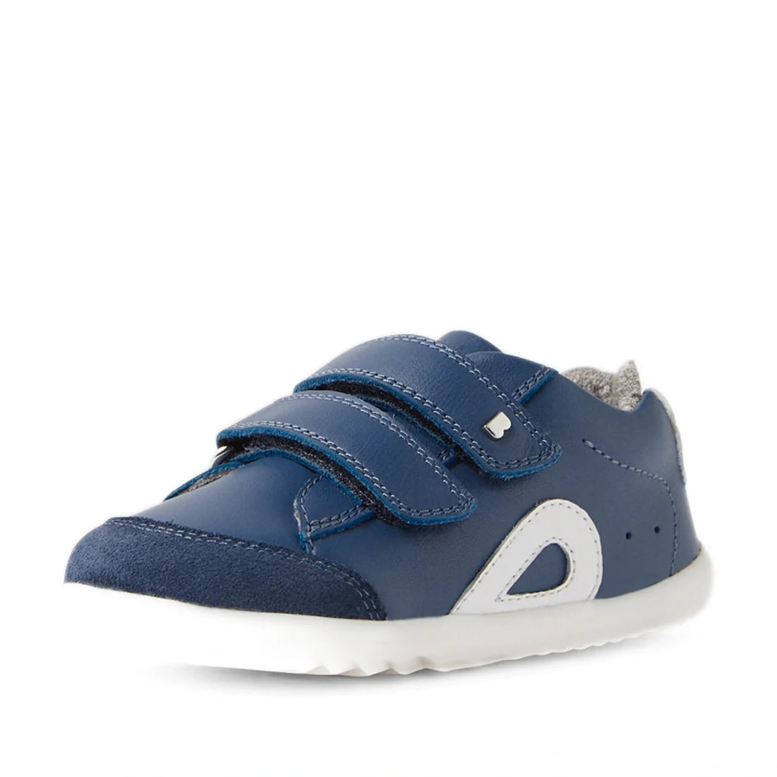 The Bobux SU Step Up Blaze Leather Toddlers Sneaker in Vintage Indigo features a blue leather upper with white accents, two Velcro straps, and a white rubber sole. Crafted from quick-drying leather, this comfortable first walking sneaker is displayed agai