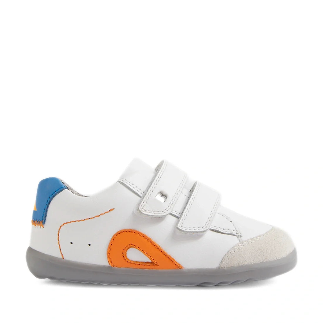 The Bobux SU Step Up Blaze Leather Toddlers Sneaker in White Orange features a white upper with a gray sole, orange and blue accents, a suede toe, and two hook-and-loop straps. Made from quick-drying leather, this stylish kid’s sneaker is displayed in a s
