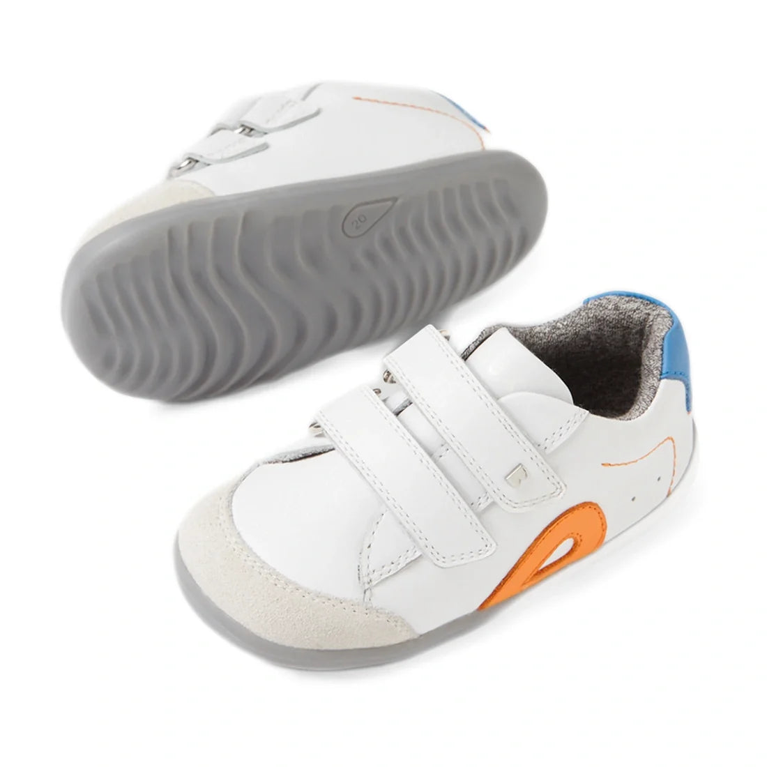 Introducing the Bobux SU Step Up Blaze Leather Toddlers Sneaker White Orange: These sneakers feature white leather uppers, gray soles, orange and blue accents, and a cozy gray inner lining. Made from quick-drying leather, they offer two hook-and-loop stra