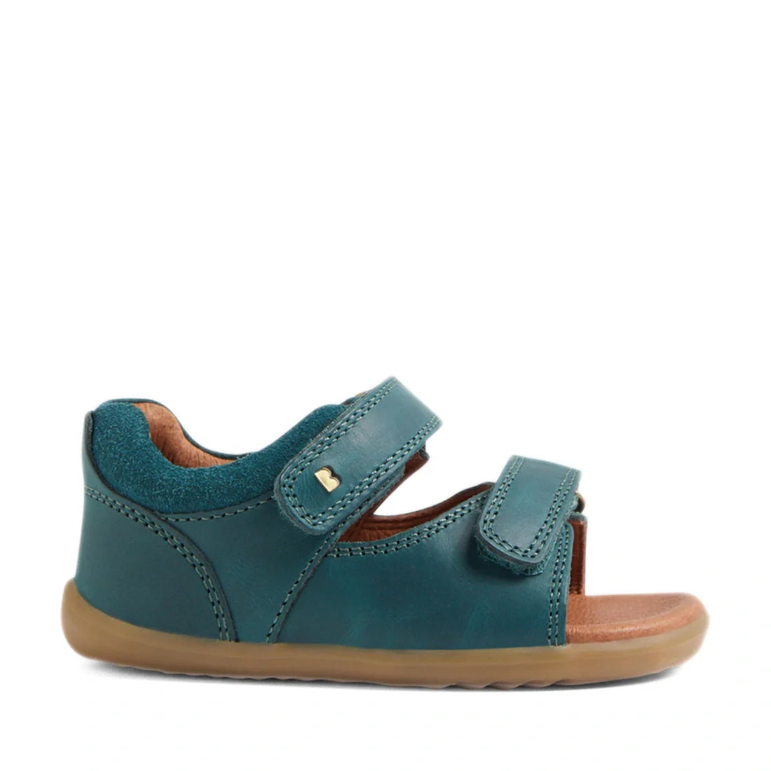 The Bobux SU Step Up Driftwood First Walker Open Toe Sandal in Mediterranean Green is a children’s sandal featuring two adjustable Velcro straps, a cushioned brown insole, and a flexible light brown rubber sole—ideal as boys’ leather sandals or first walk