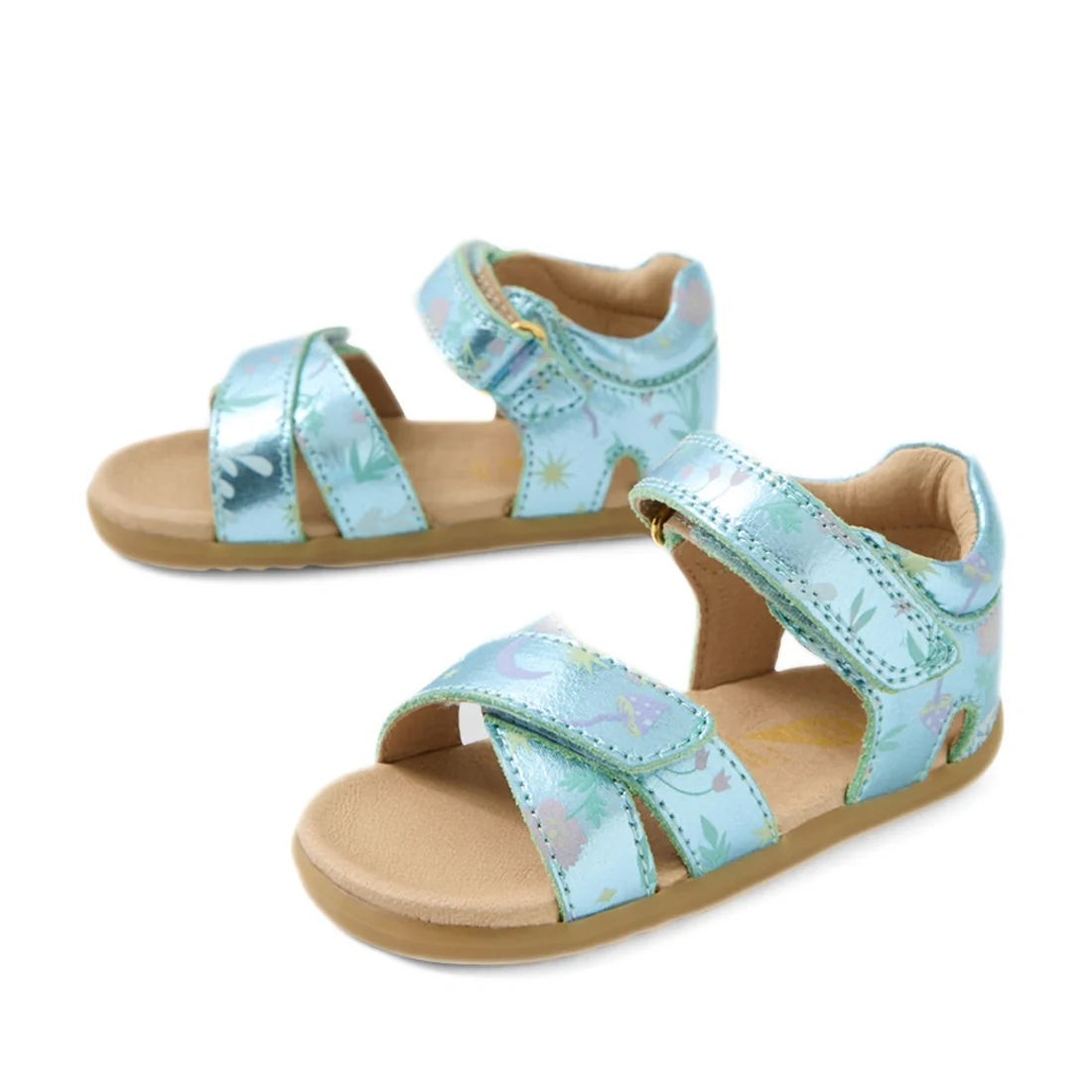 A pair of mint and metallic blue Bobux Step Up Flora First Walker sandals, featuring playful open toes, beige soles, and adjustable Velcro straps—these comfy leather shoes are perfect for little explorers. The shiny blue accents give a fresh twist to this