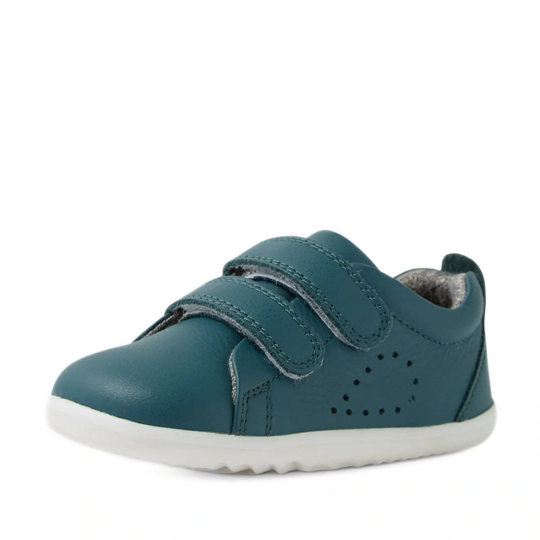 The Bobux Step Up Grass Court Trainer in Mediterranean Green is a kids’ sneaker crafted from teal leather, featuring two velcro straps, breathable side perforations, and a white sole—ideal as first walker sneakers and shown against a white background., 94