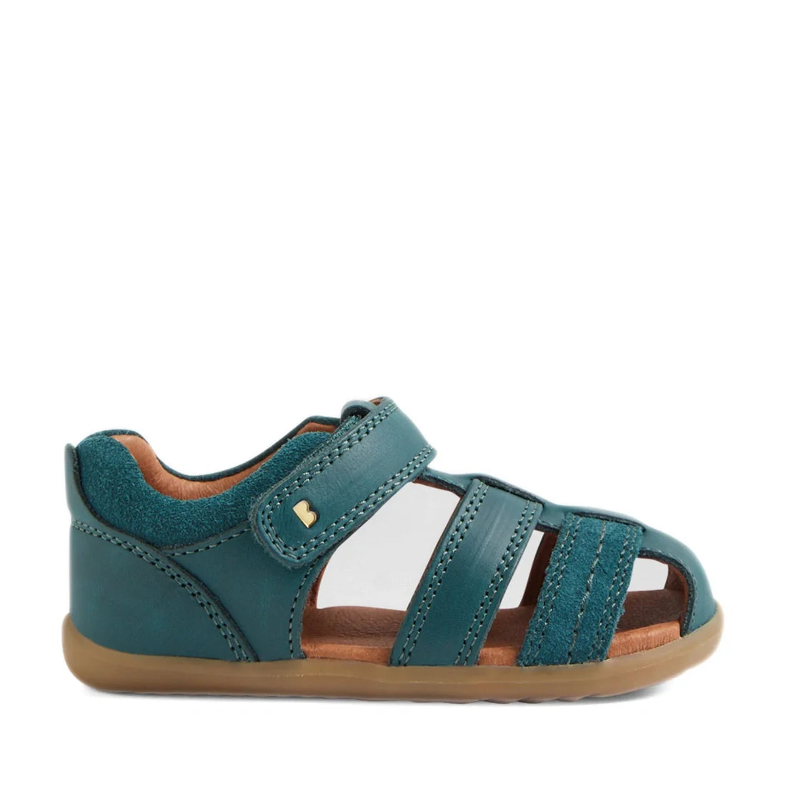A Mediterranean green, closed-toe sandal for children with a velcro strap and tan rubber sole, shown in a side profile view against a white background—perfect for little ones who love the comfort and style of the Bobux Step Up Sandal Roam Closed Toe Sanda