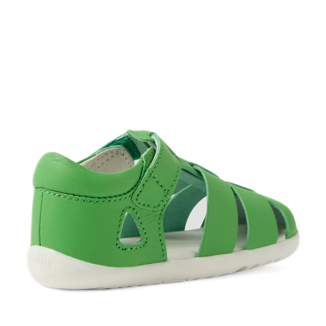 A green, closed-toe toddler sandal with a white sole and a Velcro strap, viewed from the back left side—the Bobux Step Up SU Toddlers Tidal Retro Green Closed Toe Sandal is designed for little adventurers taking their first steps in style., 9420074808424,