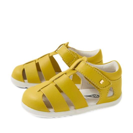 The Bobux Step Up SU Toddlers Tidal Mango Mint Yellow Closed Toe Sandal, featuring Velcro straps and white soles, is crafted from water-friendly leather and shown on a plain white background.