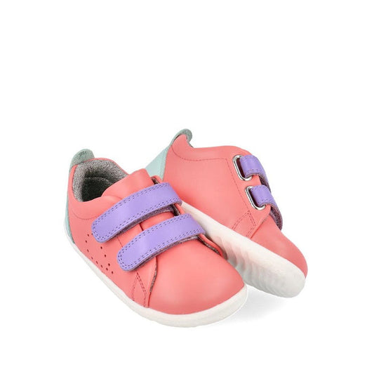 Bobux Step Up Grass Court Trainer Ocean Coral 734208—toddler shoe in pink leather, easy purple straps, safe white soles. White background.  ksnz