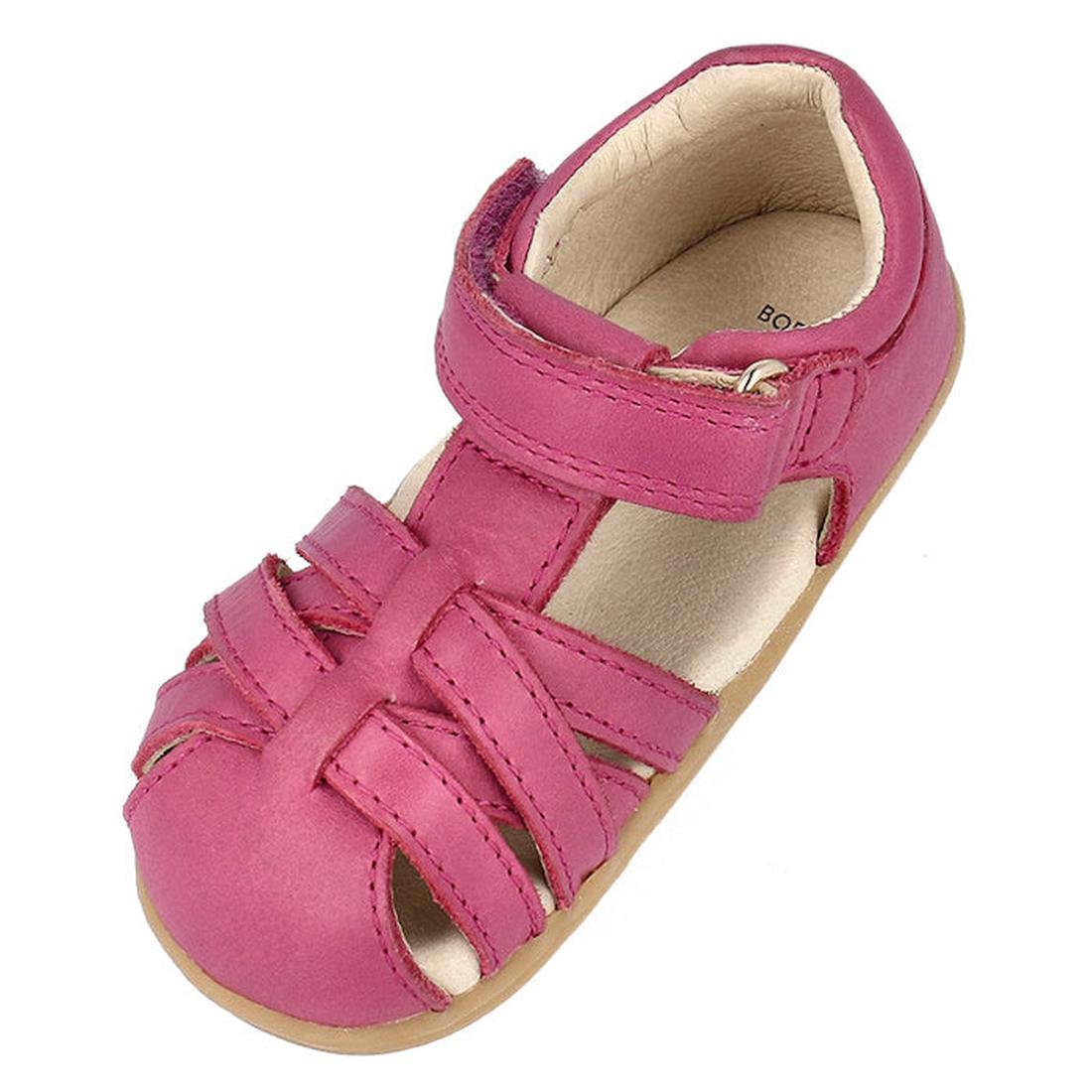 The Bobux Step Ups Cross Jump Mauve Haze 731116 is a pink closed-toe first walker sandal for kids, featuring woven leather upper straps, an ankle hook-and-loop closure, and a soft beige lining and sole., 9420075773622, 9420075773288, 9420075769649, 942007