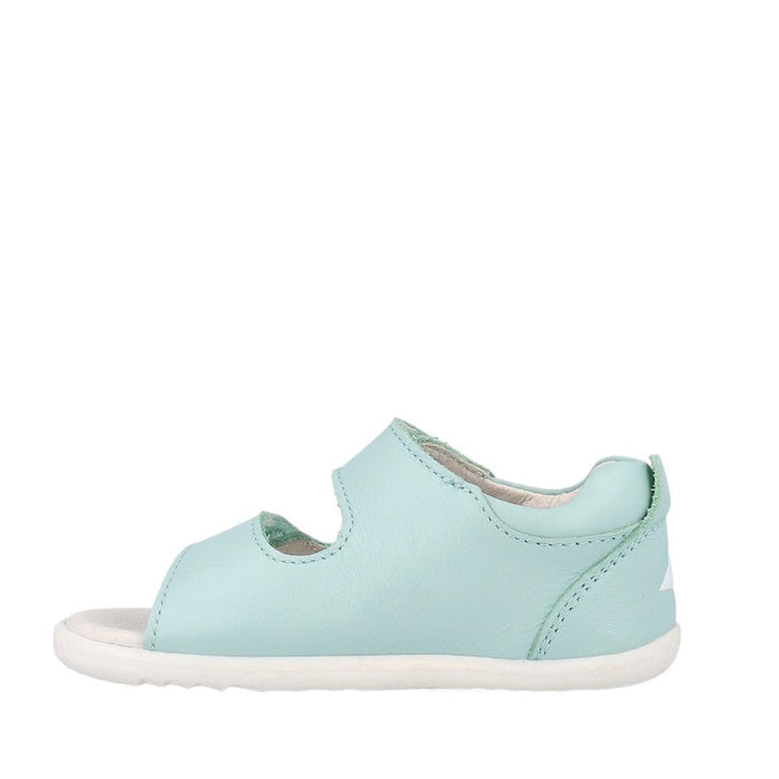 The Bobux Step Up Topia Sandal First Walker 751302 in Fresh Mint is a light blue leather toddler sandal with an open toe, side cutout, white sole, and closed heel—ideal as your child's first walking sandal. Displayed in profile on a white background., 942