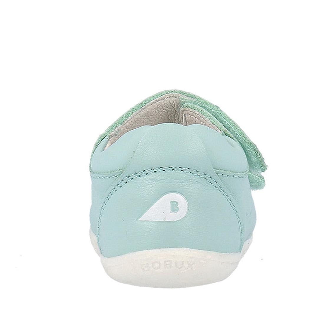 The Bobux Step Up - Topia Sandal First Walker 751302 in Fresh Mint is a light blue sandal with a white logo, mint green strap, white sole, and faint BOBUX branding on the heel, seen from the back., 9420075763784, 9420075763692, 9420075763647, 942007576374