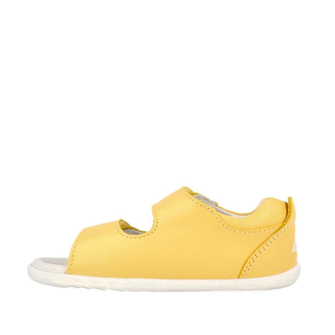 The Bobux Step Up - Topia First Walker Sandal 751304 in Pineapple Yellow is a children's sandal with double straps, a white sole, and a closed heel, shown from the side., 9420075763722, 9420075763654, 9420075764422, 9420075764446