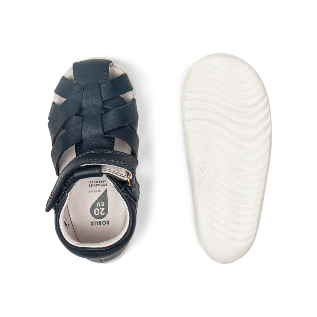 A top and bottom view of the Bobux Step Up Tropicana II Navy Sandal 732301 Quick Dry shows a closed toe, buckle strap, and white textured sole in quick-dry leather, displayed on a plain white background., 9420068504158, 9420068504165, 9420068504172