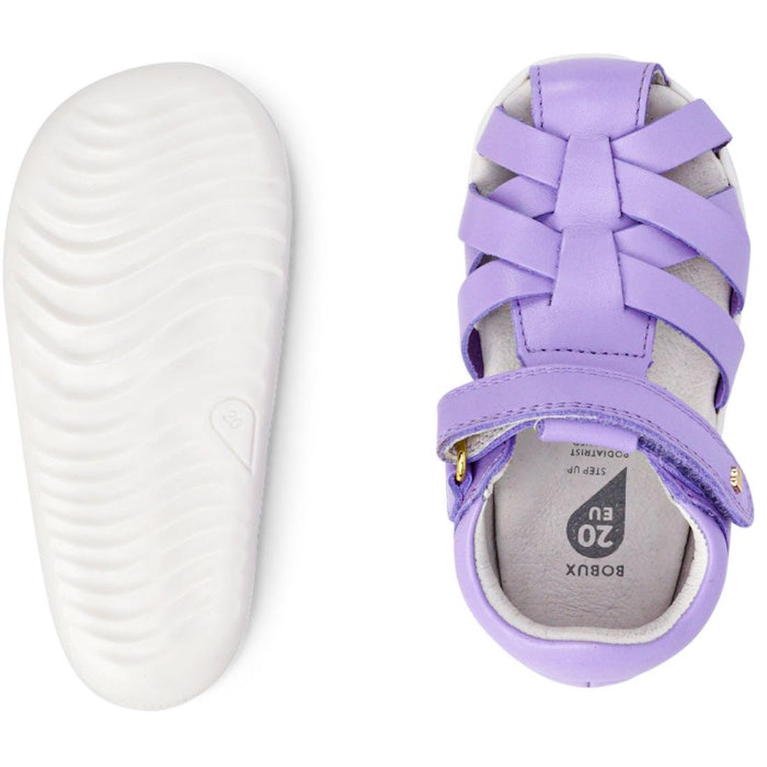 The Bobux Step Up Tropicana II Lilac Toddler Girls Sandal 732315 features a closed toe, woven straps in light purple Quick Dry Leather, and a flexible white sole with a wavy texture, shown from above and below., 9420071314096, 9420071314102, 9420071314119