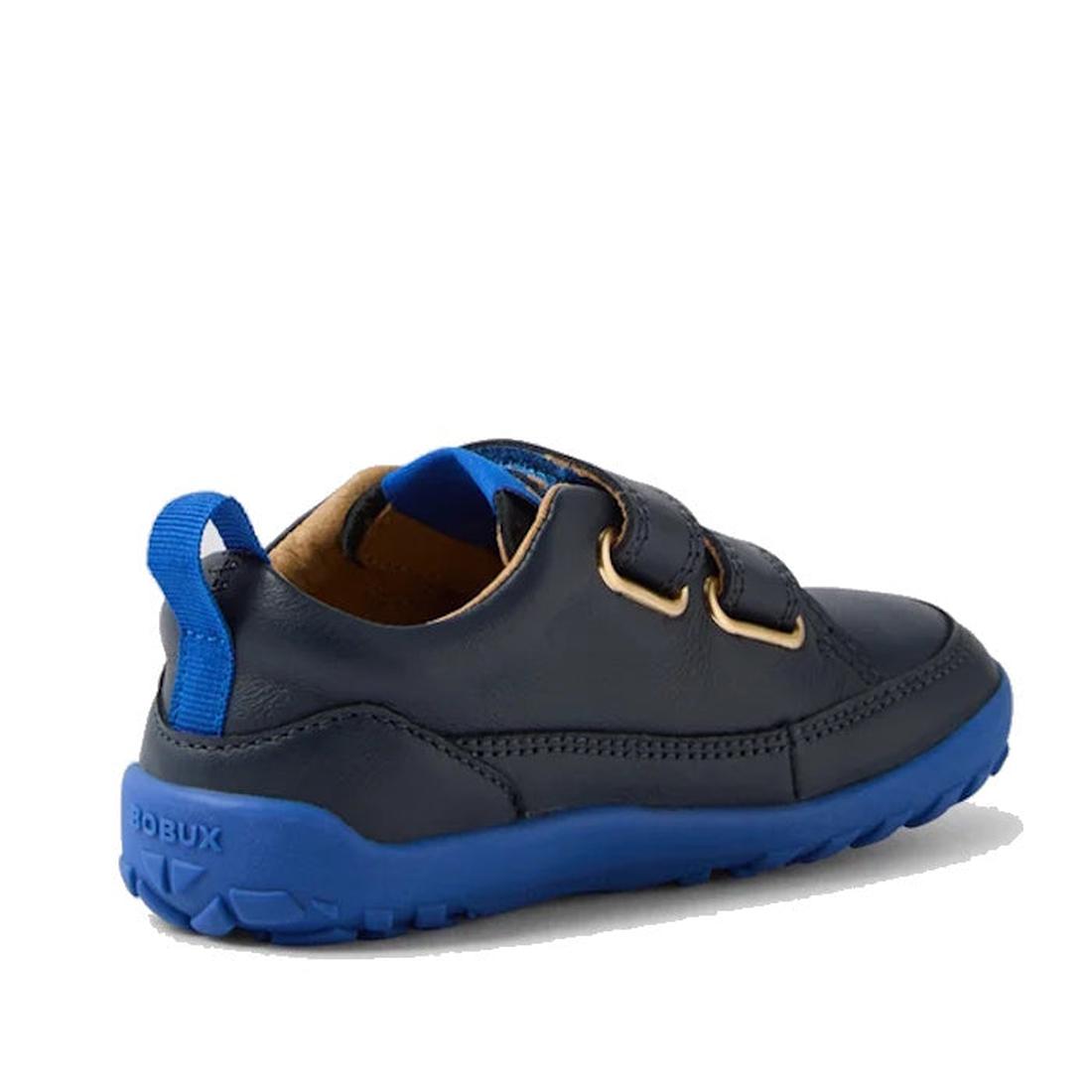 The Bobux IW Iwalk Dawn Toddlers Leather Sneaker Navy Alpha Barefoot features navy leather, a bright blue sole, two velcro straps, and a blue pull tab—ideal toddler shoes for everyday adventures., 52197, 9420068565289, 9420068565296, 9420068565302, 942006