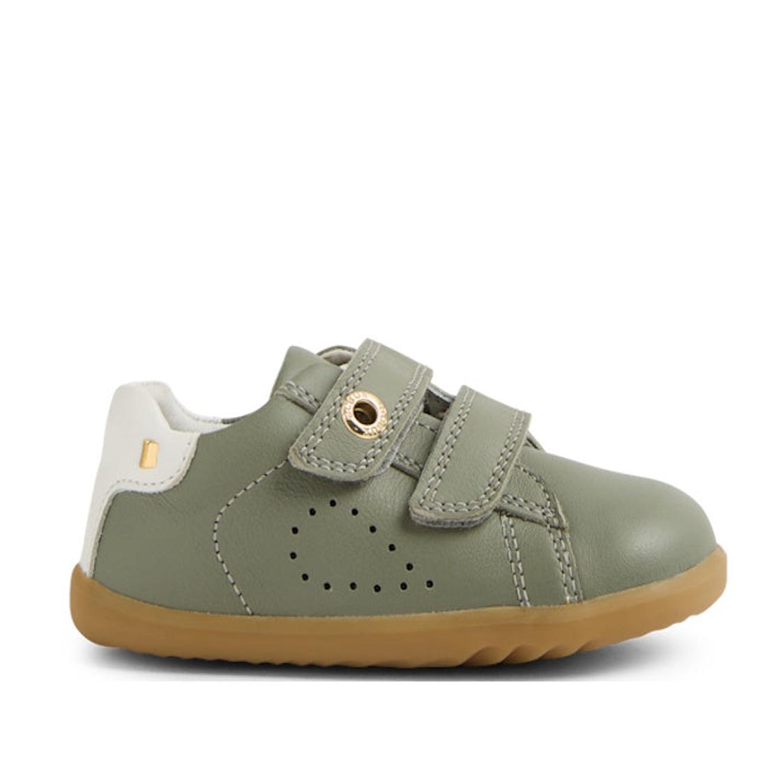 The Bobux SU Step Up Maverick Leather Toddlers Sneaker in Vetiver Green features a gum sole, white heel accent, perforated sides, and two adjustable straps—ideal as a toddler's first walker., 9420074836649, 9420074836656, 9420074836663