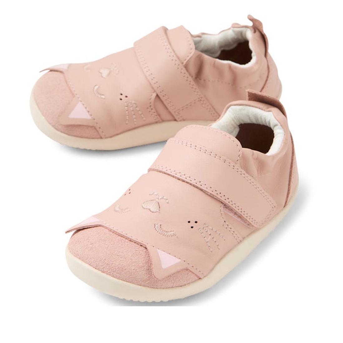 The Bobux XP Xplorer Purr First Walking Shoes in Cameo Rose Pink are toddler leather pre-walker shoes with adjustable velcro straps, soft soles, and cute cat face and ear details for a playful animal-inspired look.