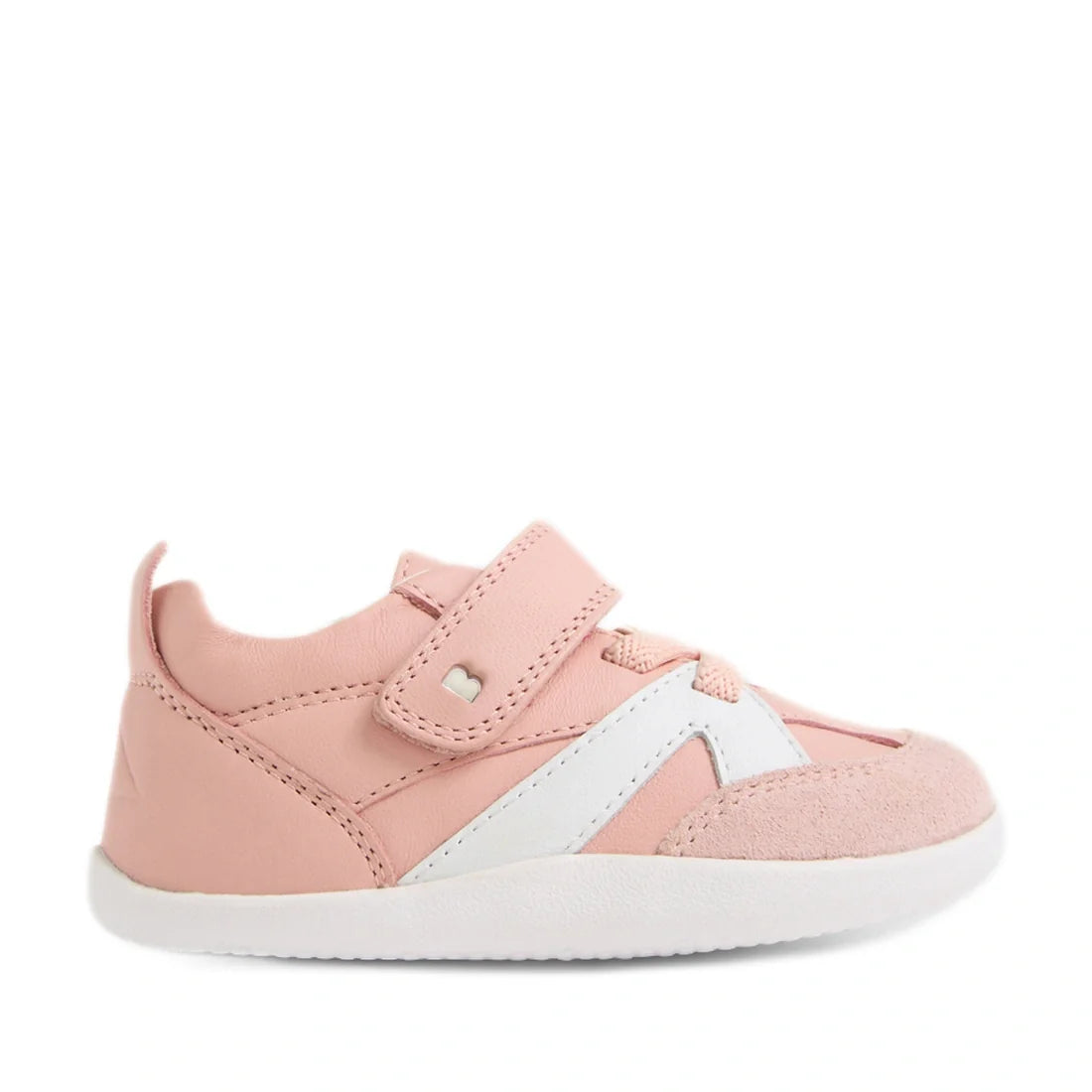 A single Bobux Xplorer XP Chase Ballet Pink First Walker Crawler shoe is shown in a side profile facing right against a white background, featuring light pink leather, a white sole, white accents, and a Velcro strap—perfect pre-walker footwear for little 
